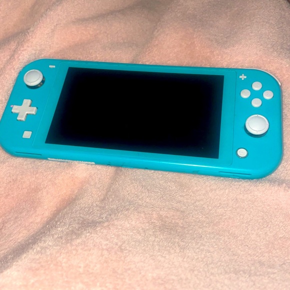 Lite blue Nintendo switch with charger - Picture 1 of 2